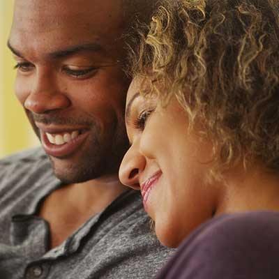 African American couple smiling together