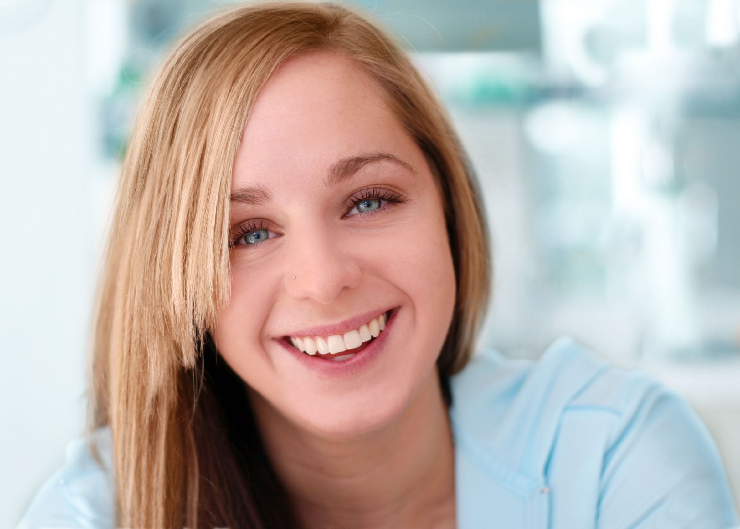 close up of blonde haired girl smiling